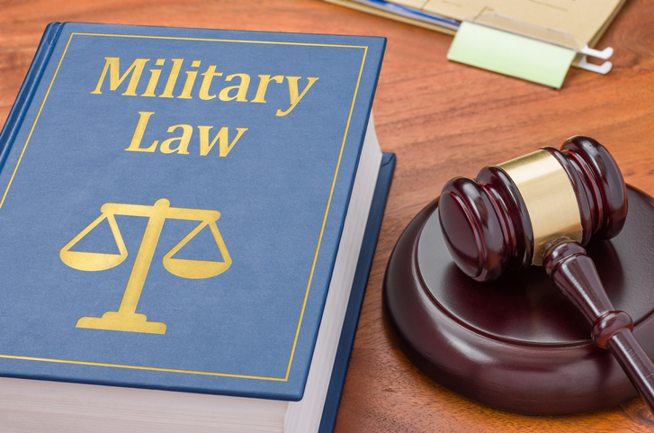 Law book with a gavel - Military law